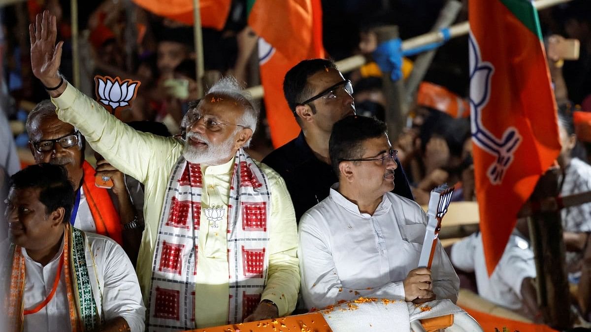 <div class="paragraphs"><p>FILE PHOTO: India's Prime Minister Narendra Modi waves towards his supporters during a roadshow as part of an election campaign, in Kolkata, India, May 28, 2024. </p></div>