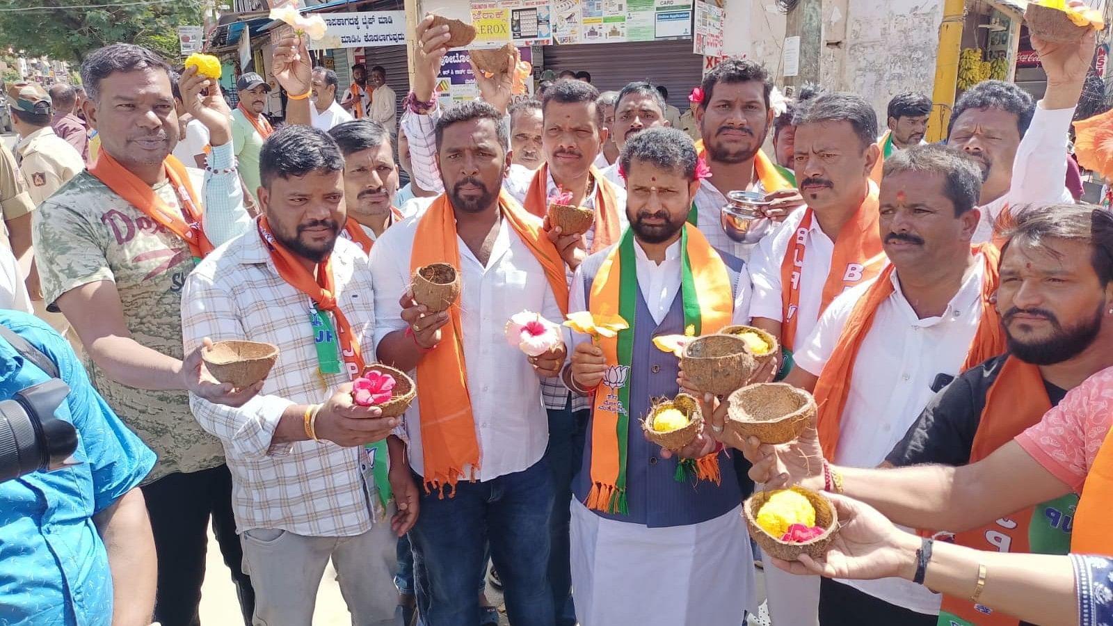 <div class="paragraphs"><p>BJP Yuva Morcha members hold a protest against hike in petrol and diesel prices by holding coconut shells in hand, in Chikkamagaluru on Sunday. </p></div>