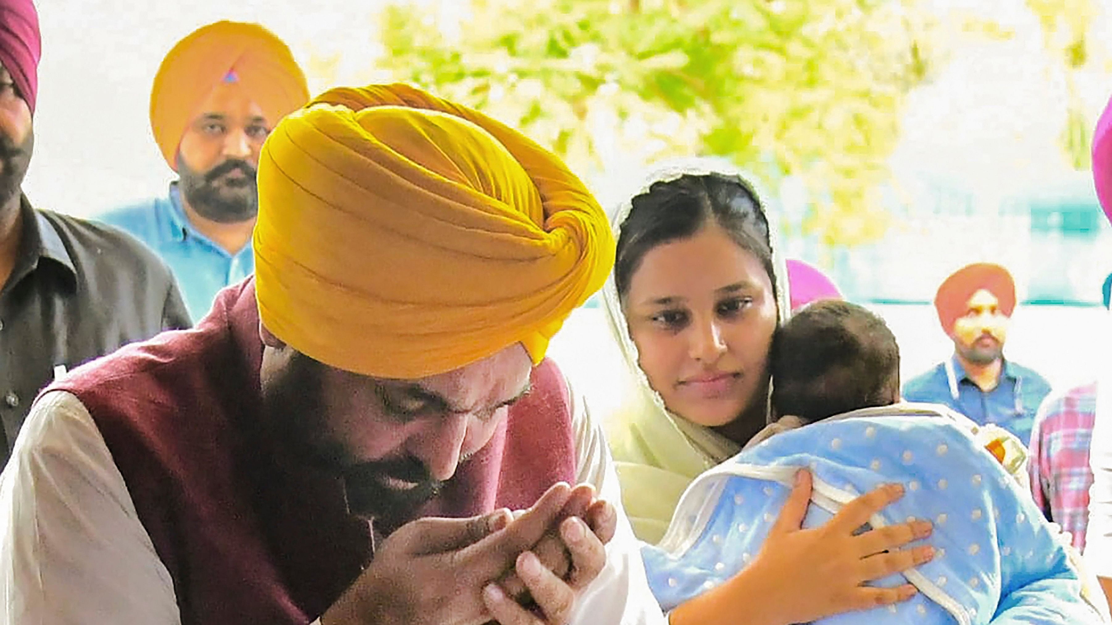 <div class="paragraphs"><p> Punjab CM Bhagwant Mann performs rituals while entering his newly rented house with his family, in Jalandhar.</p></div>