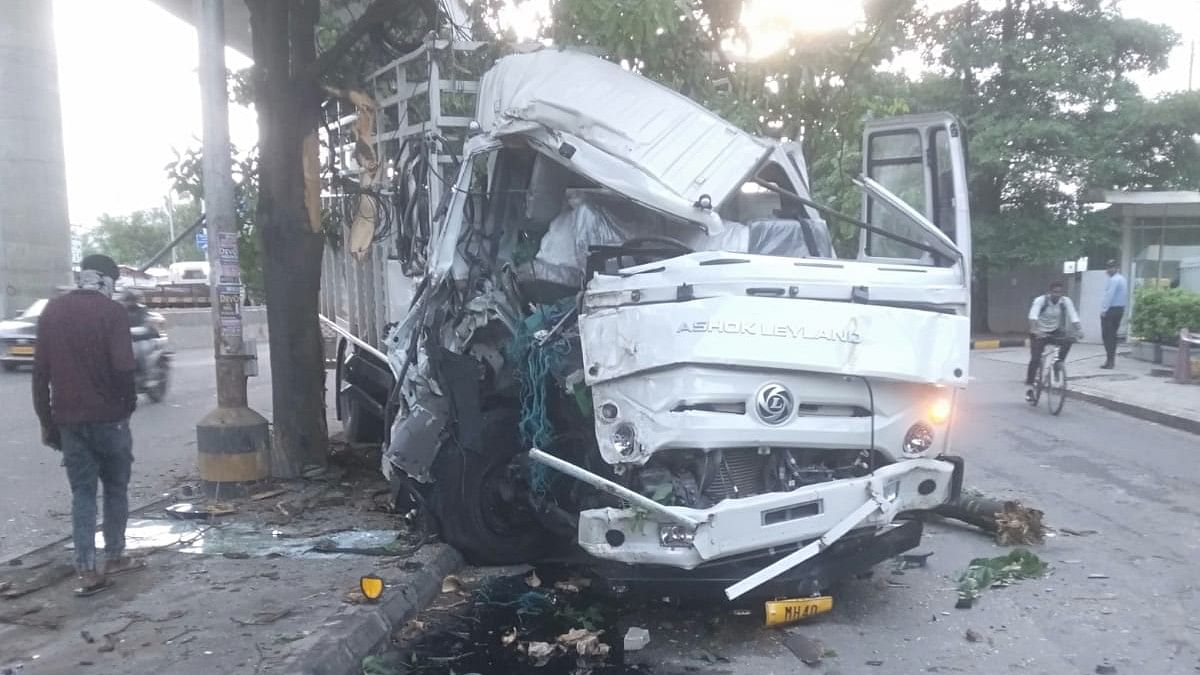 <div class="paragraphs"><p>The goods truck that crashed into a tree and two poles on the Outer Ring Road on Monday.</p></div>