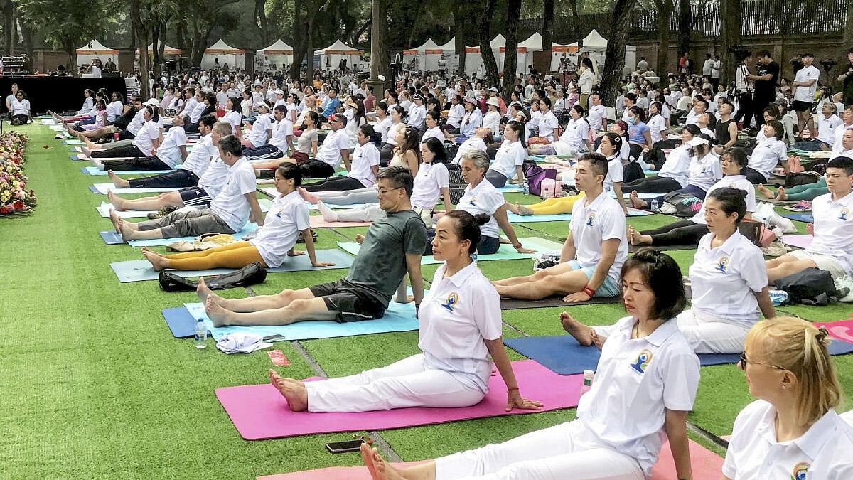 <div class="paragraphs"><p>Chinese Yoga enthusiasts take part in the International Yoga Day event held at the Indian Embassy, in Beijing.</p></div>