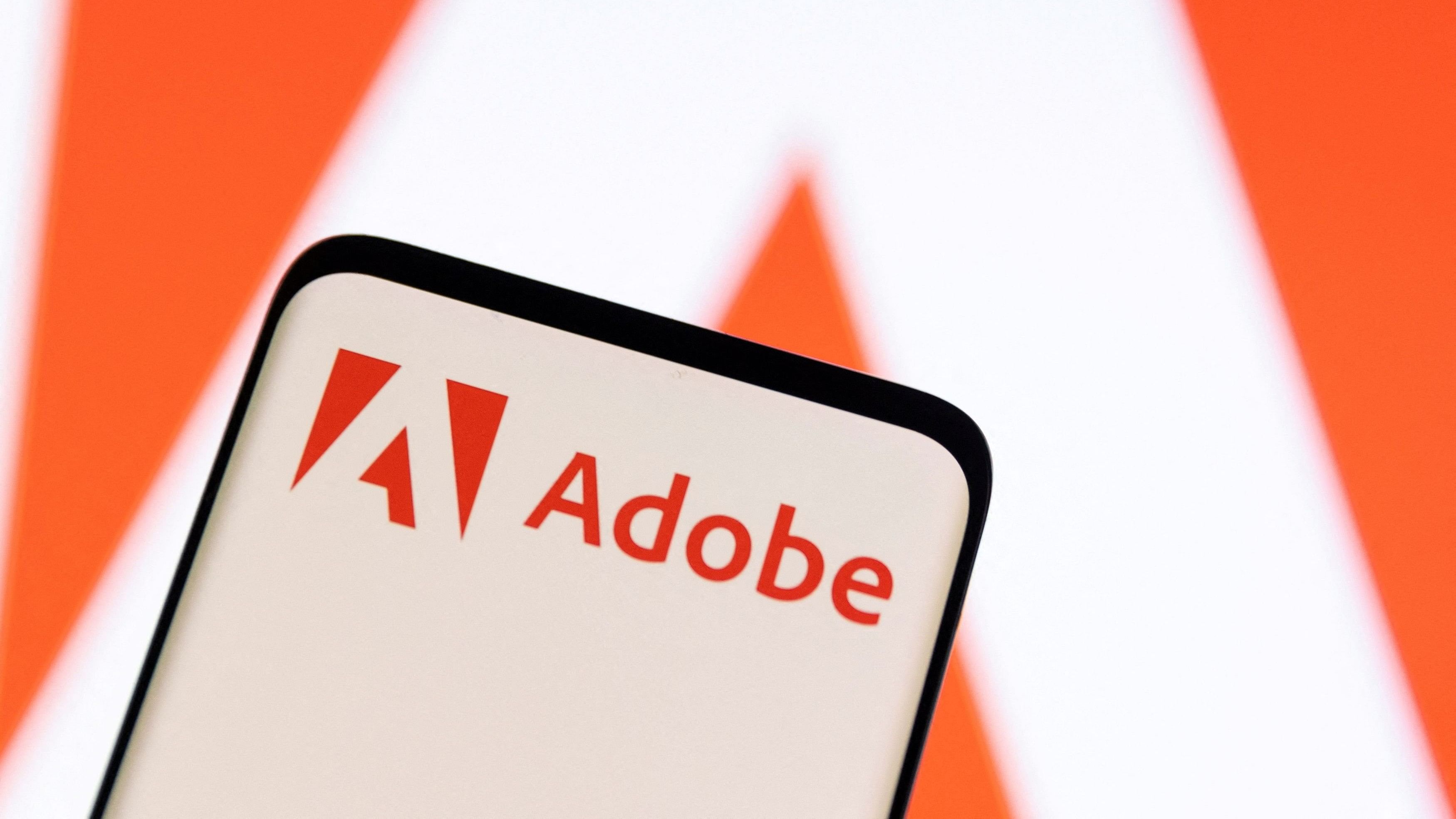 <div class="paragraphs"><p>Adobe logo is seen on smartphone.&nbsp;</p></div>