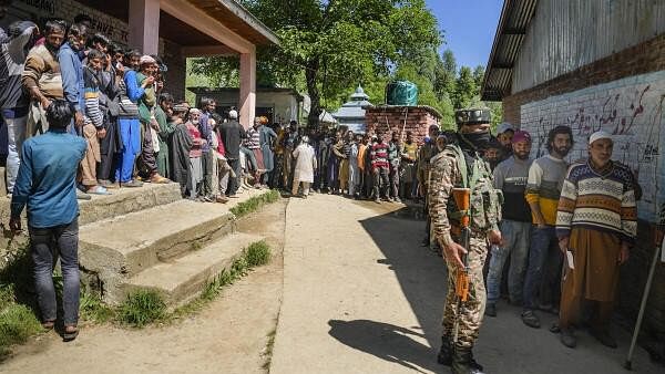 <div class="paragraphs"><p>Representative image showing people standing in a queue to vote at Nandimarg area in Kulgam district of South Kashmir.</p></div>