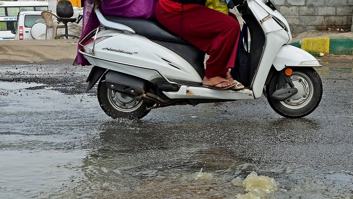 <div class="paragraphs"><p>An overflowing manhole at Veerabhadra Nagar signal on the Outer Ring Road.&nbsp;</p></div>