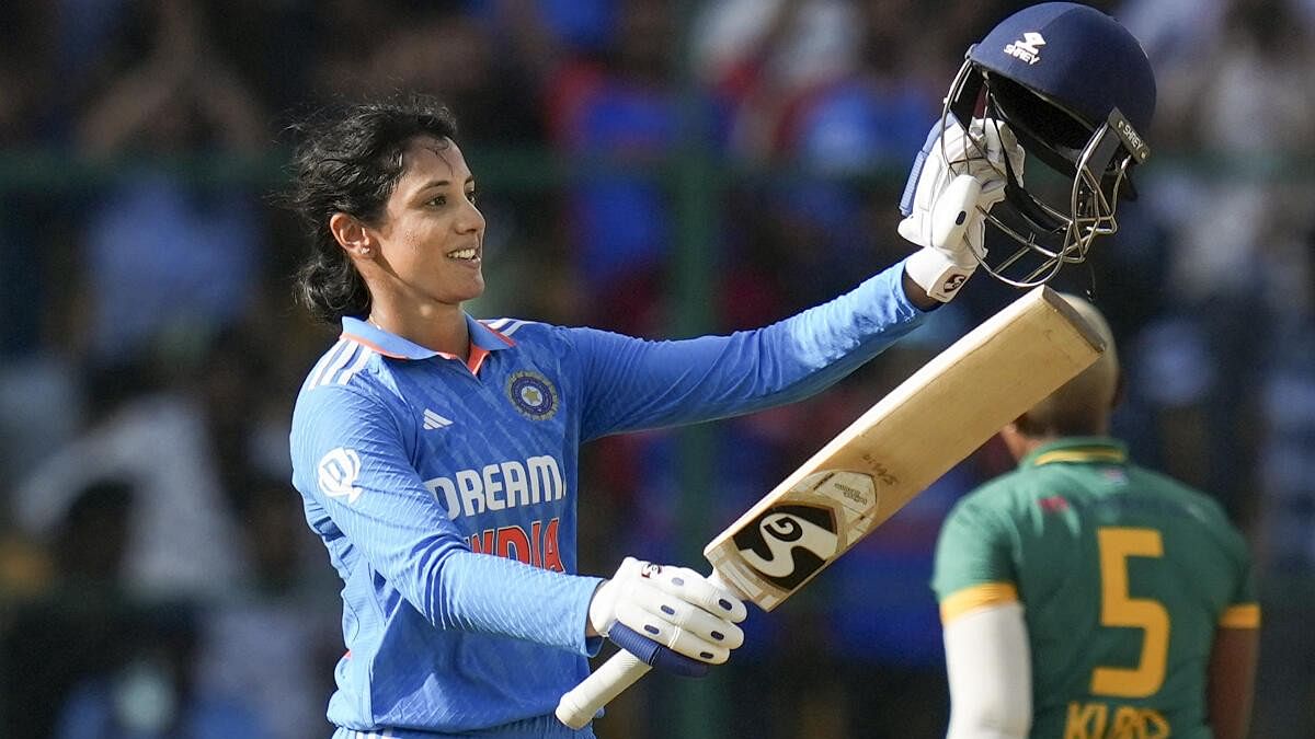 <div class="paragraphs"><p>Indian batter Smriti Mandhana celebrates her century during the first women's ODI cricket match between India and South Africa at M Chinnaswamy Stadium, in Bengaluru, Sunday, June 16, 2024.</p></div>