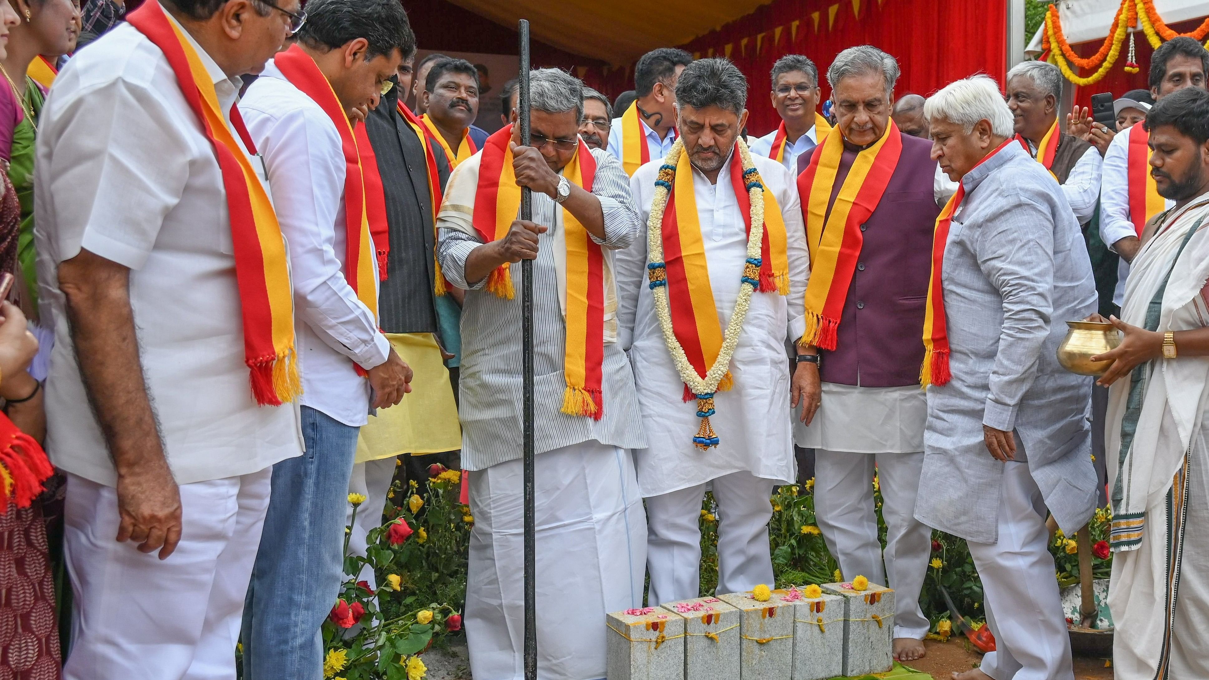 <div class="paragraphs"><p>Chief Minister Siddaramaiah breaks the ground to start work for the installation of the Goddess Bhuvaneshwari statue at Vidhana Soudha in Bengaluru on Thursday. Deputy Chief Minister D K Shivakumar and Legislative Council chairman Basavaraj Horatti are seen. </p></div>