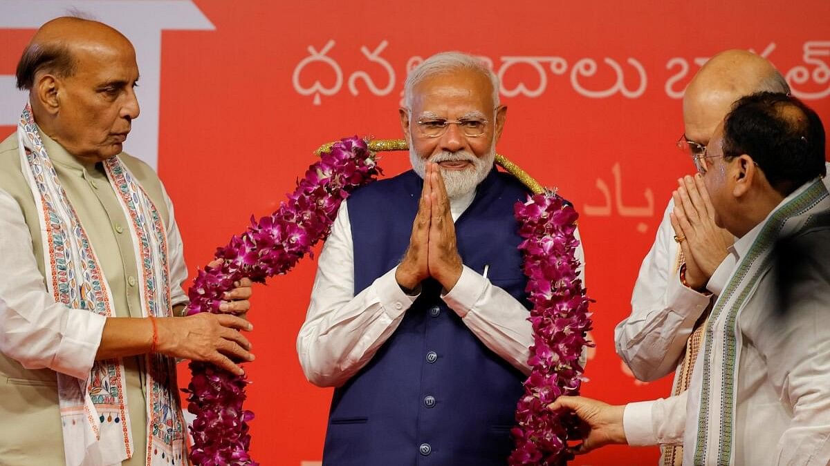 <div class="paragraphs"><p>Narendra Modi gestures, at the Bharatiya Janata Party (BJP) headquarters in New Delhi after the results of the Lok Sabha elections were announced.&nbsp;</p></div>