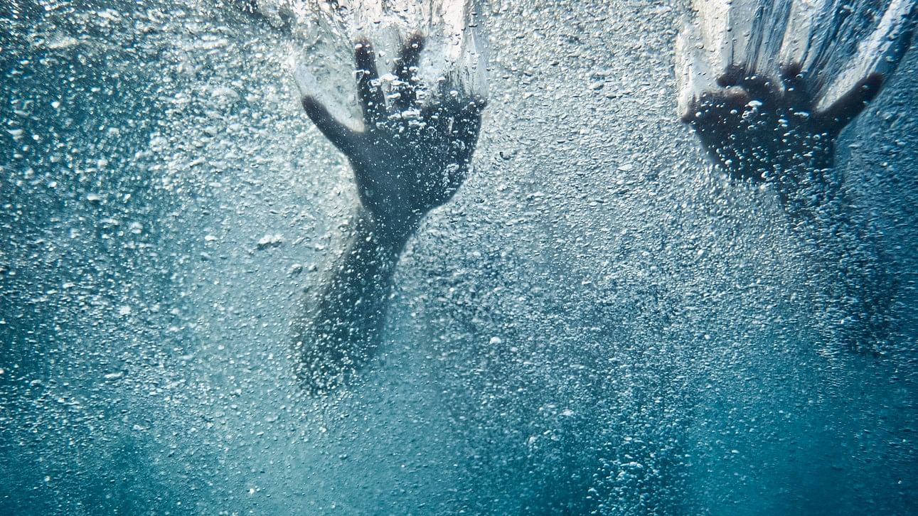 <div class="paragraphs"><p>Image showing two hands underwater. For representational purposes only.</p></div>