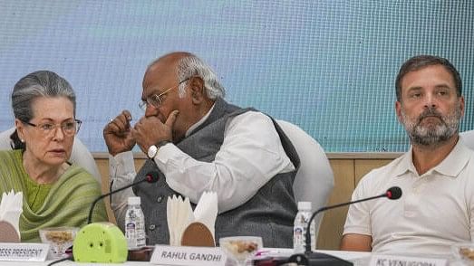 <div class="paragraphs"><p>Congress President Mallikarjun Kharge with party leaders Sonia Gandhi and Rahul Gandhi during the CWC meeting’ at AICC headquarters, in New Delhi.</p></div>