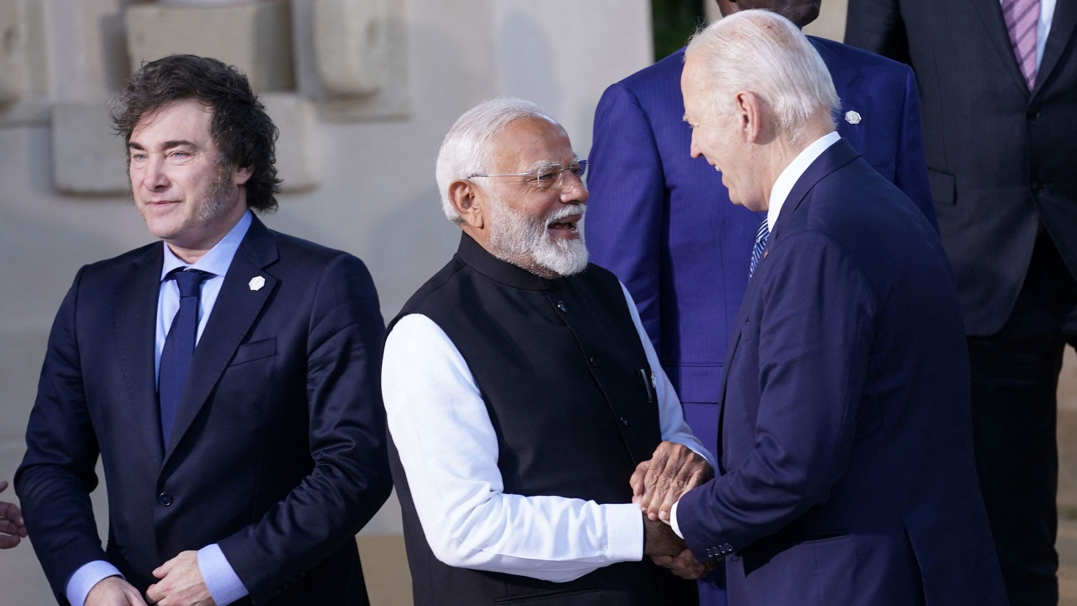 <div class="paragraphs"><p>US President Joe Biden shakes hands with India's Prime Minister Narendra Modi next to Argentina's President Javier Milei.</p></div>