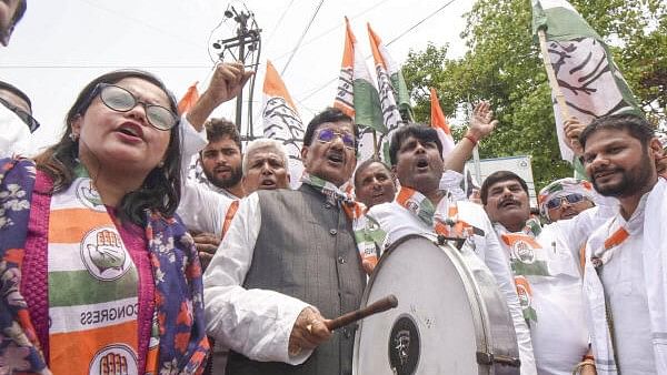 <div class="paragraphs"><p>Congress workers take part in a protest over the alleged irregularities in NEET-UG 2024 results, in Patna.</p></div>