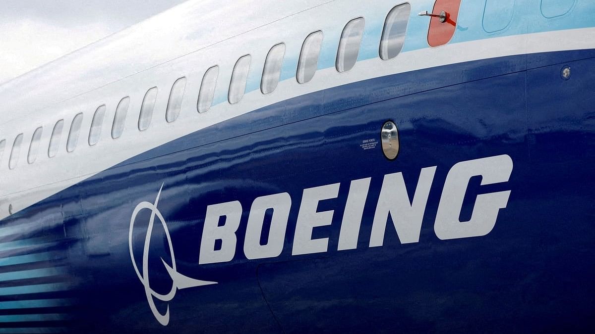 <div class="paragraphs"><p>File photo showing the Boeing logo is seen on the side of a Boeing 737 MAX at the Farnborough International Airshow, Britain.</p></div>