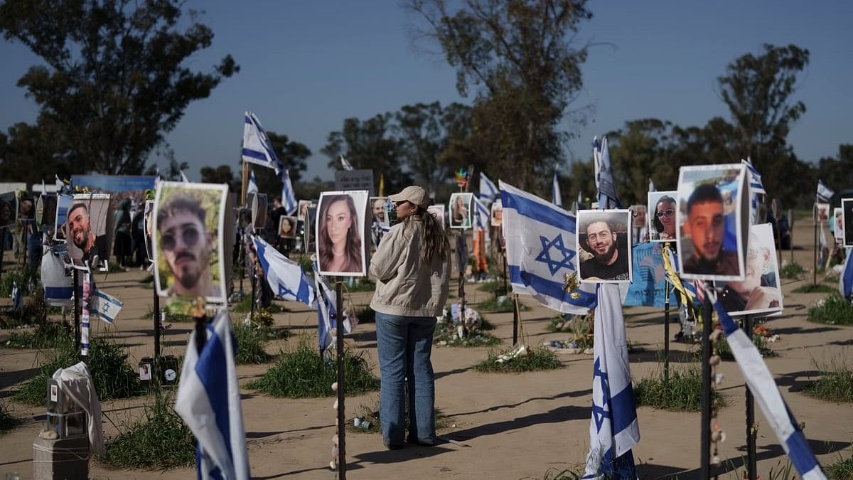 <div class="paragraphs"><p>A woman visits the site where revelers were killed and kidnapped on Oct 7 cross-border attack by Hamas militants at the Nova music festival near the kibbutz Reim, southern Israel.</p></div>