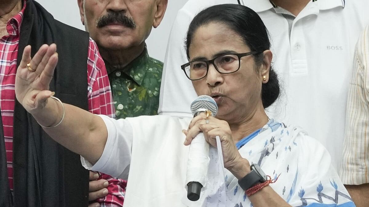 <div class="paragraphs"><p>West Bengal Chief Minister and TMC Supremo Mamata Banerjee interacts with the media after a meeting with newly elected MPs of the party at her Kalighat residence, in Kolkata, Saturday, June 8, 2024.</p></div>