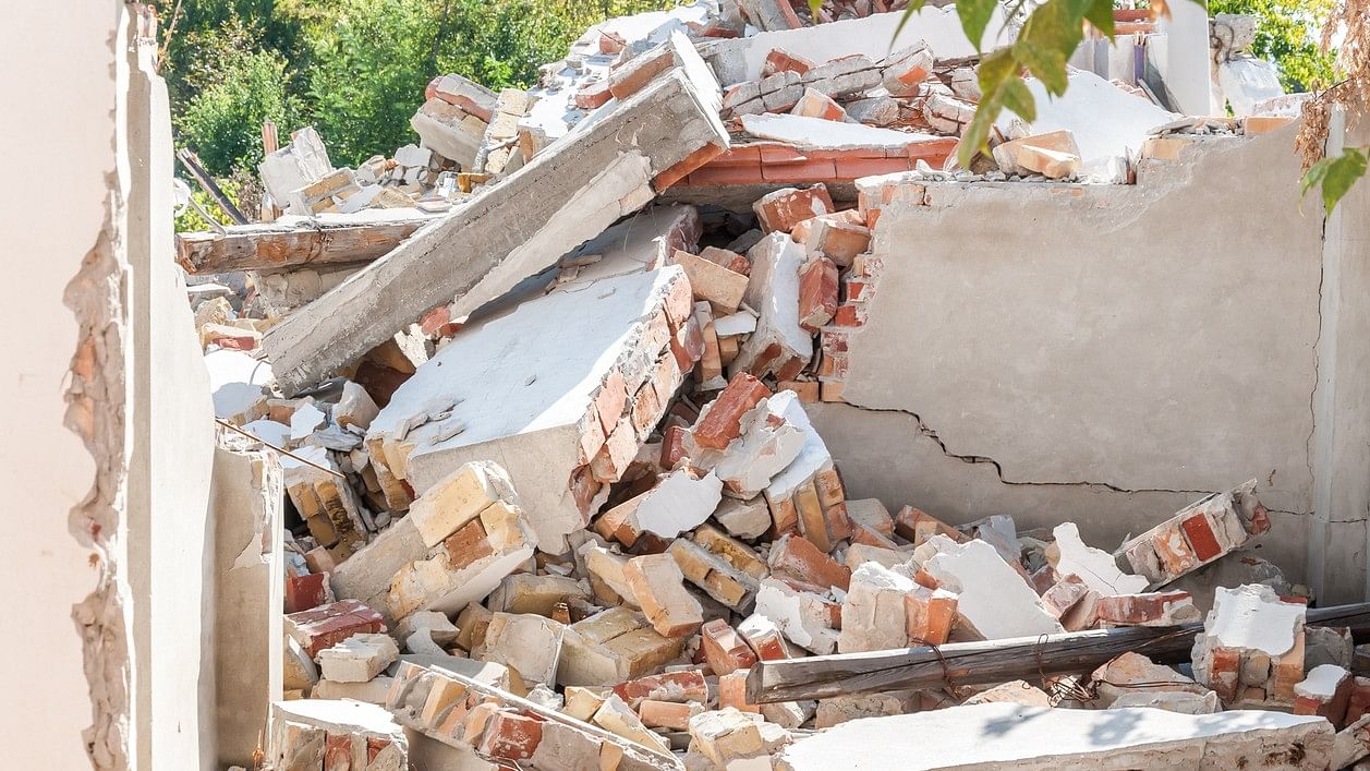 <div class="paragraphs"><p>Representative image showing wall debris</p></div>