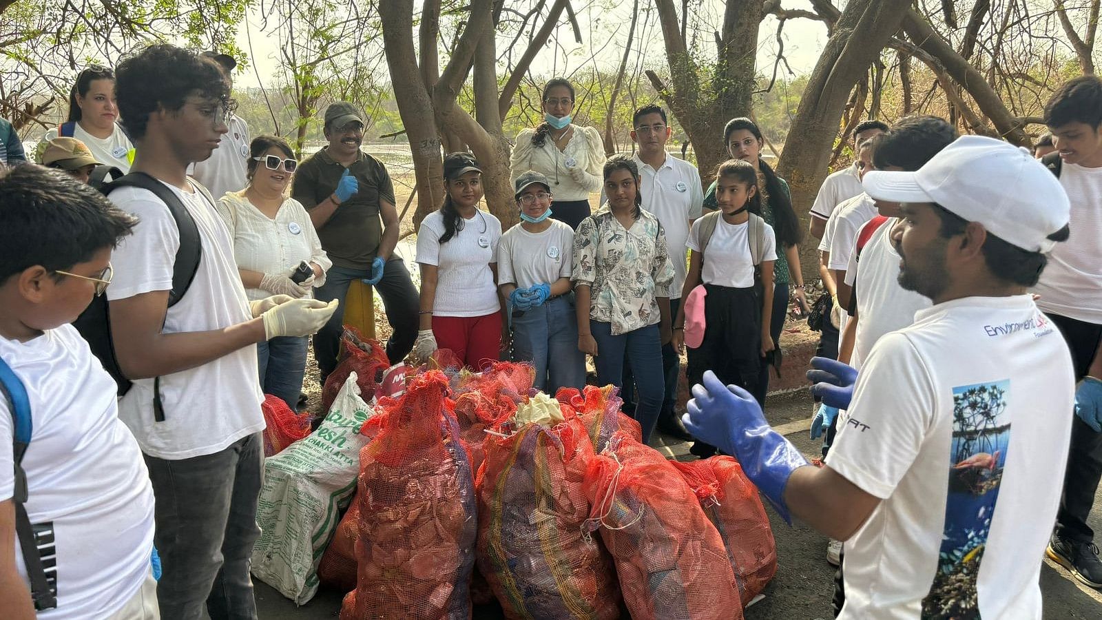 <div class="paragraphs"><p>Garbage being collected at DPS Lake.</p></div>