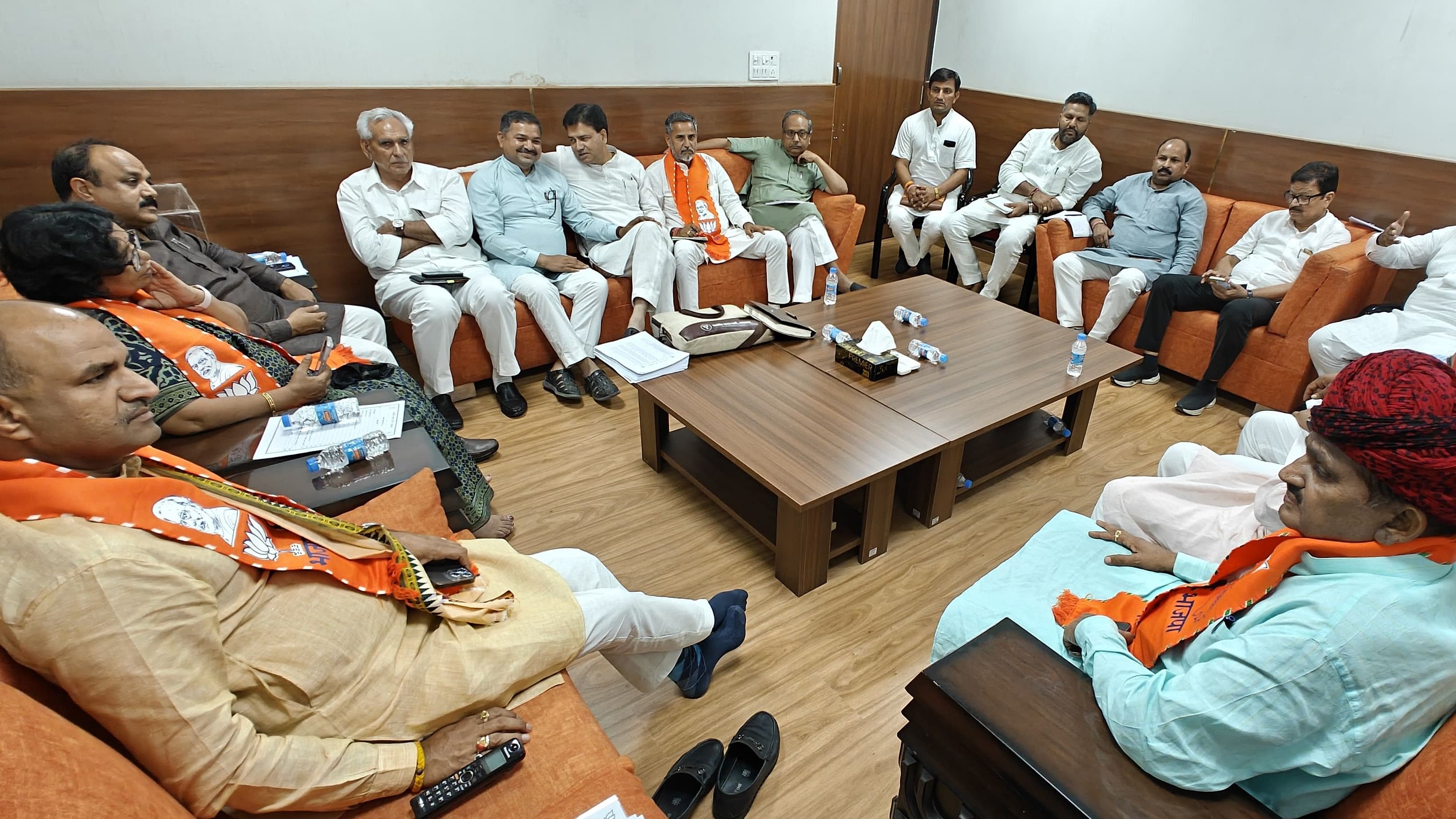 <div class="paragraphs"><p>BJP state unit chief C P Joshi along with other leaders at the meeting.&nbsp;</p></div>