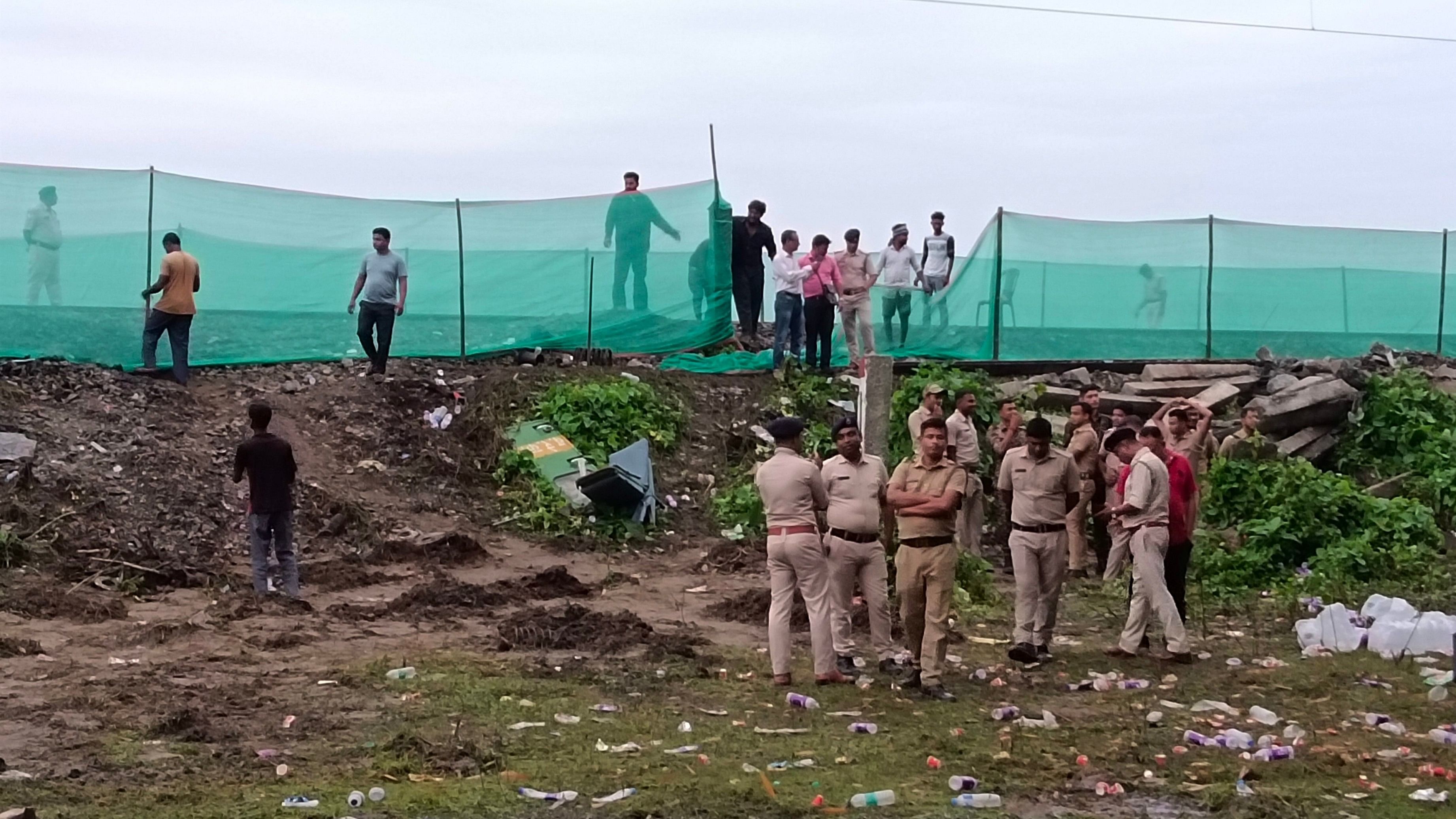 <div class="paragraphs"><p>New Jalpaiguri: Police personnel and railway workers at the accident site during restoration of train services a day after the collision between the Kanchanjunga Express and a goods train, near Rangapani railway station, Tuesday, June 18, 2024. </p></div>