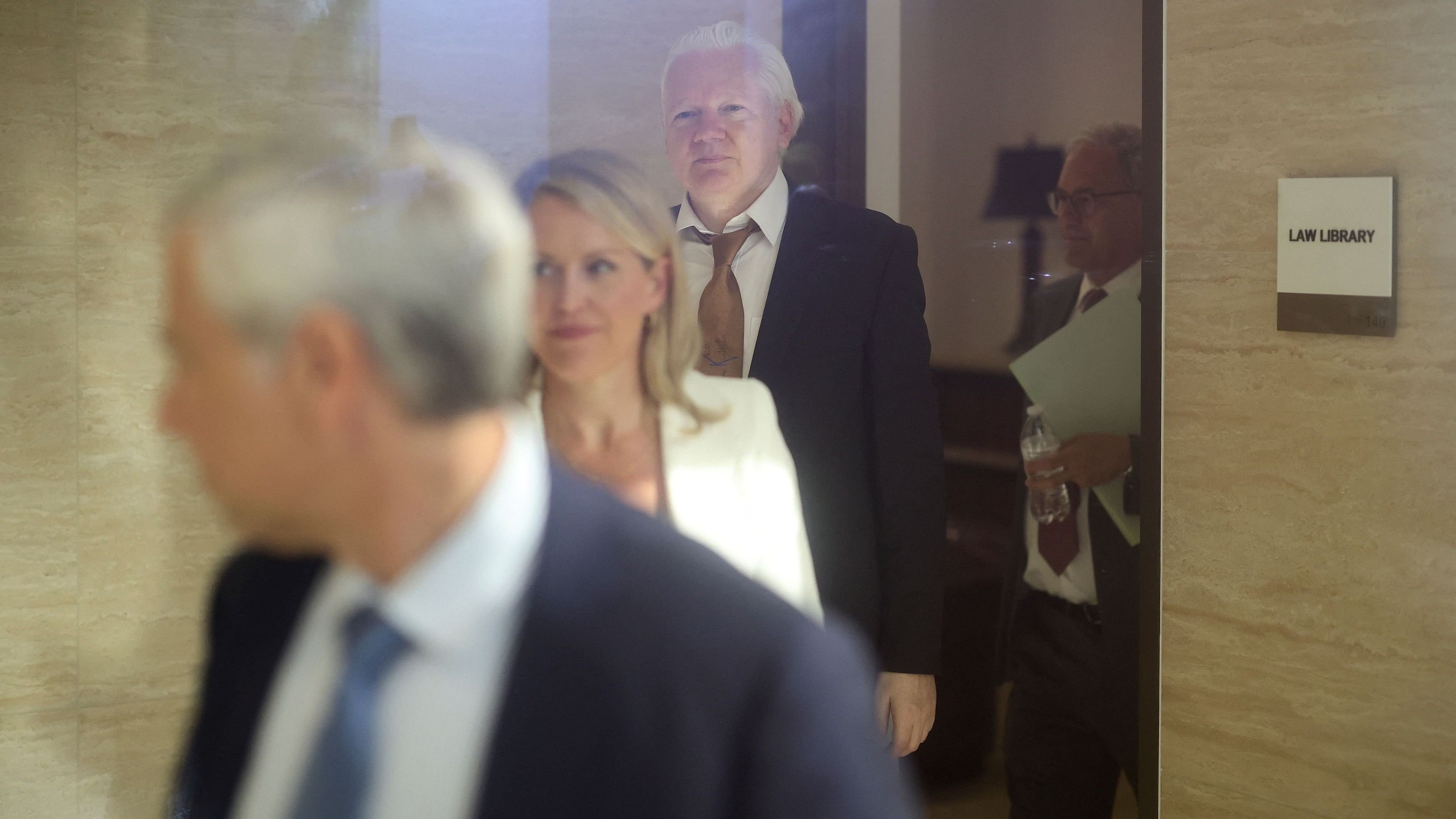 <div class="paragraphs"><p>WikiLeaks founder Julian Assange walks inside the building at a United States District Court in Saipan, Northern Mariana Islands, US, June 26, 2024. </p></div>