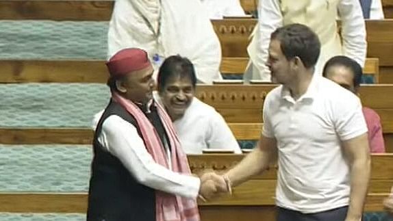 <div class="paragraphs"><p>Samajwadi Party MP Akhilesh Yadav shakes hands with Congress' Rahul Gandhi during the first session of the 18th Lok Sabha, in New Delhi, Tuesday, June 25, 2024.</p></div>