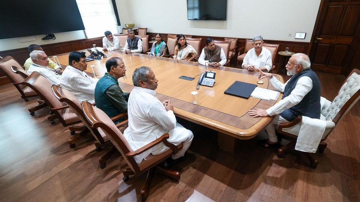 <div class="paragraphs"><p>Janata Dal (United) MPs with Prime Minister Narendra Modi during a meeting, at the Parliament House in New Delhi. </p></div>