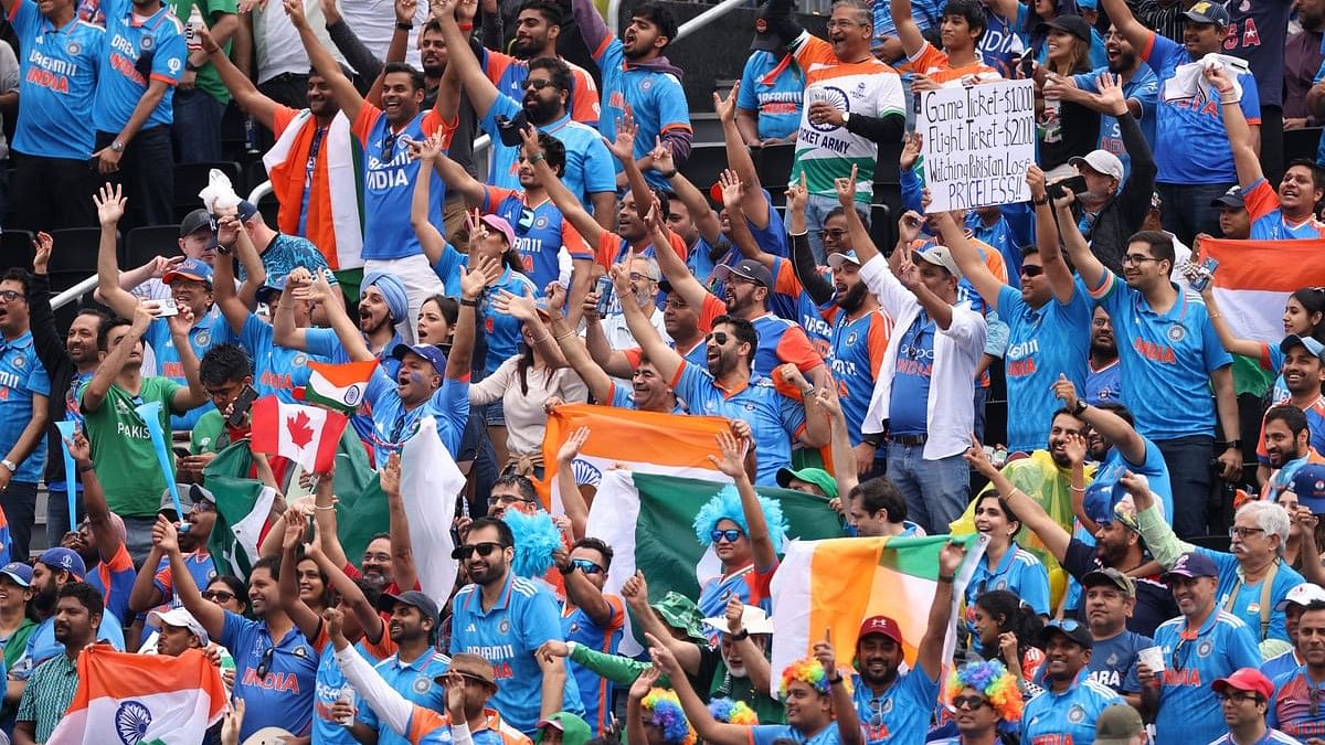 <div class="paragraphs"><p>India fans react in the stand during a rain delay in the match.</p></div>