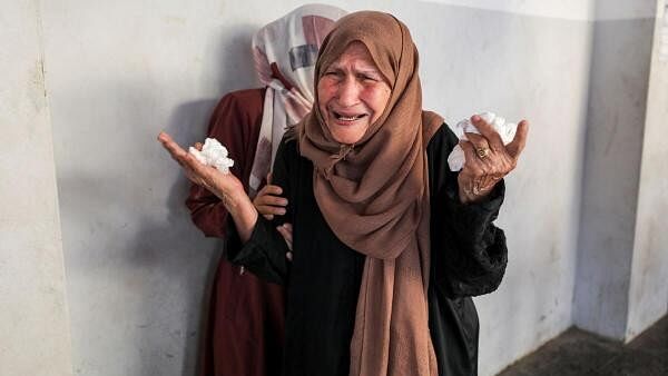 <div class="paragraphs"><p>A relative reacts during the funeral of Palestinians who were killed in an Israeli strike, amid Israel-Hamas conflict, at Al-Ahli al-Arabi hospital in Gaza City, June 25, 2024.</p></div>