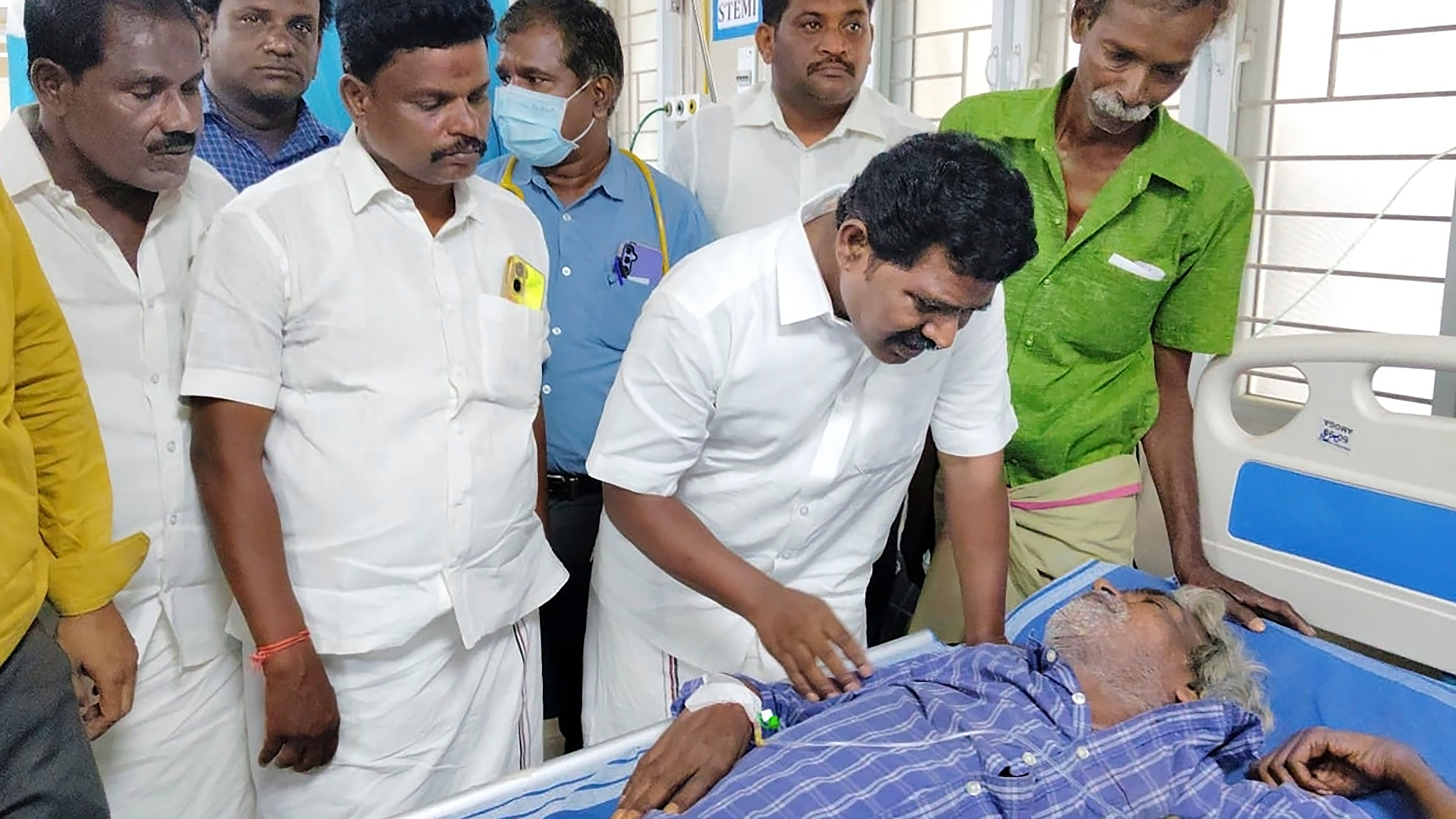 <div class="paragraphs"><p>A person undergoes treatment after consumption of spurious liquor, in Kallakurichi distict of Tamil Nadu, Wednesday, June 19, 2024.</p></div>