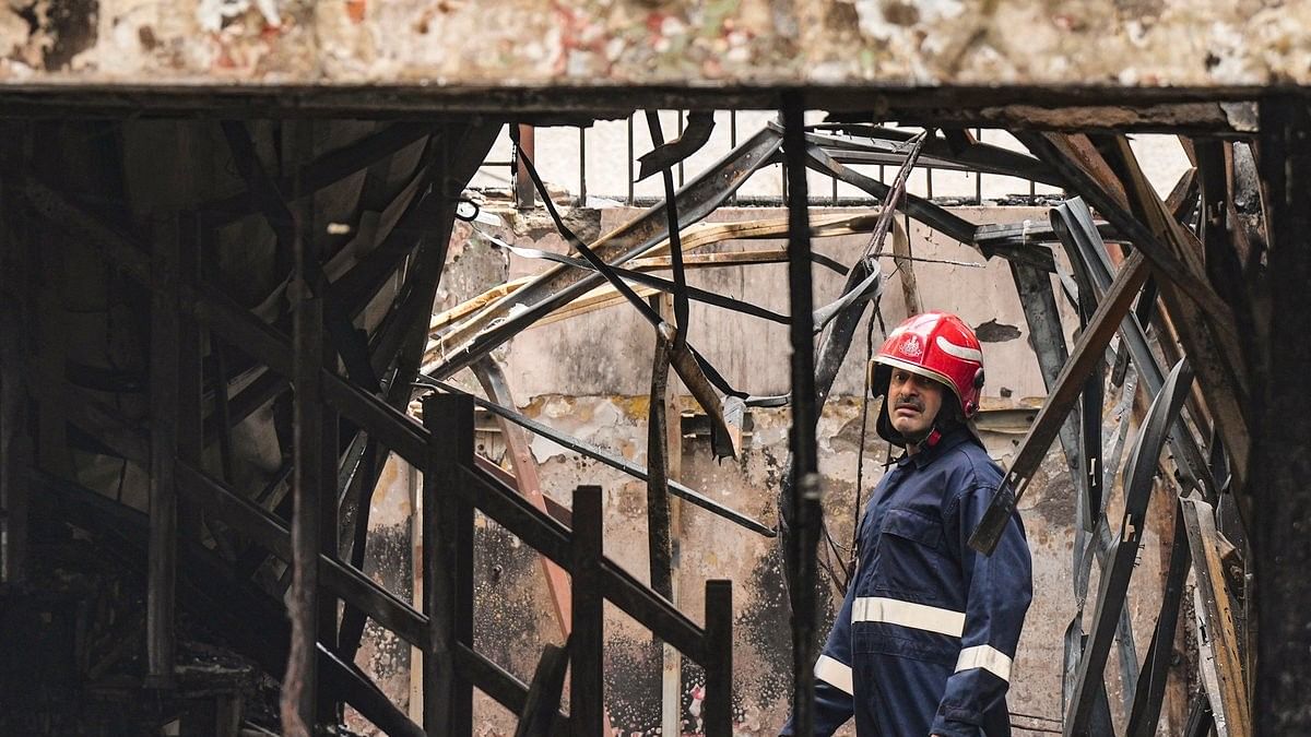 <div class="paragraphs"><p>A firefighter at the site where a fire broke out at an eye hospital, in Lajpat Nagar, New Delhi.</p></div>