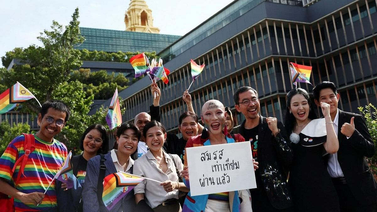 <div class="paragraphs"><p>Members of the LGBTQ+ community celebrate after the passing of the marriage equality bill in its second and third readings by the Senate, which will effectively make Thailand Asia's third territory to legalise same-sex unions, in Bangkok, Thailand, June 18, 2024. </p></div>