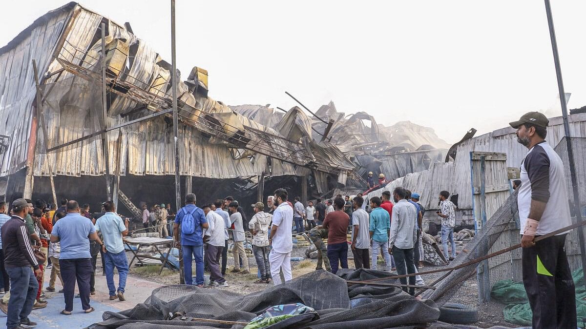 <div class="paragraphs"><p>Rescue and relief work underway after a fire broke out in a gaming zone, in Rajkot, Saturday, May 25, 2024. At least 16 persons were killed and several others injured in the massive fire.</p></div>