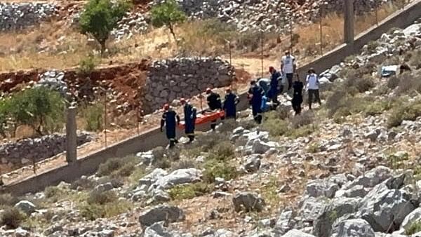 <div class="paragraphs"><p>Rescuers transfer the body of British TV presenter Michael Mosley, which was found after he had been missing, on the southeastern Aegean Sea island of Symi, Greece, June 9, 2024.</p></div>