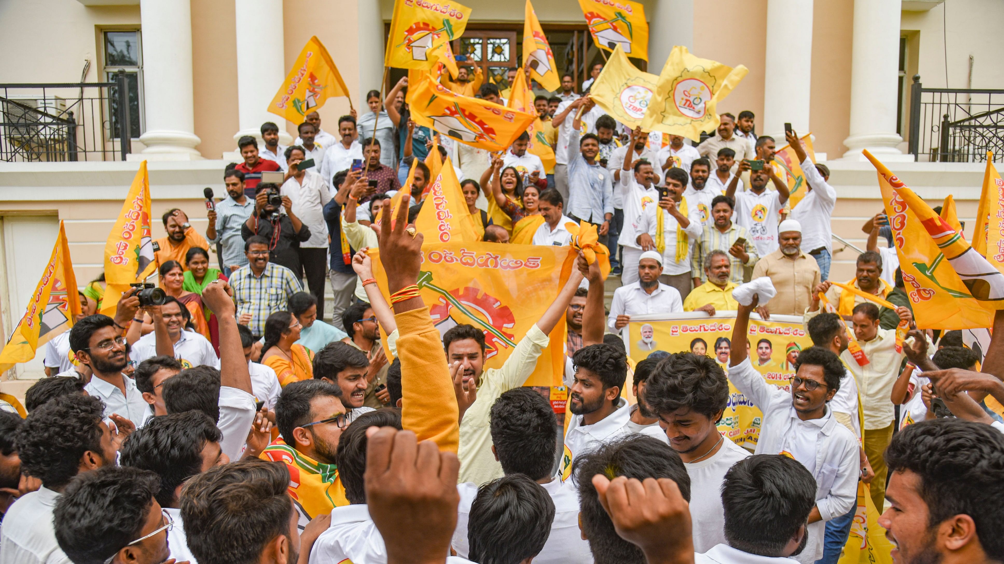 <div class="paragraphs"><p>TDP supporters celebrate the party's lead in the Andhra Pradesh Assembly polls and Lok Sabha polls, in Hyderabad.</p></div>