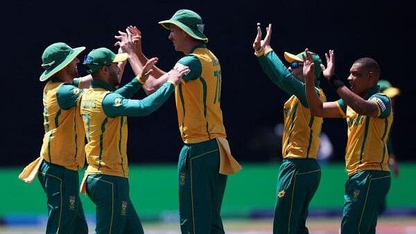 <div class="paragraphs"><p> South Africa's Marco Jansen celebrates with teammates.</p></div>