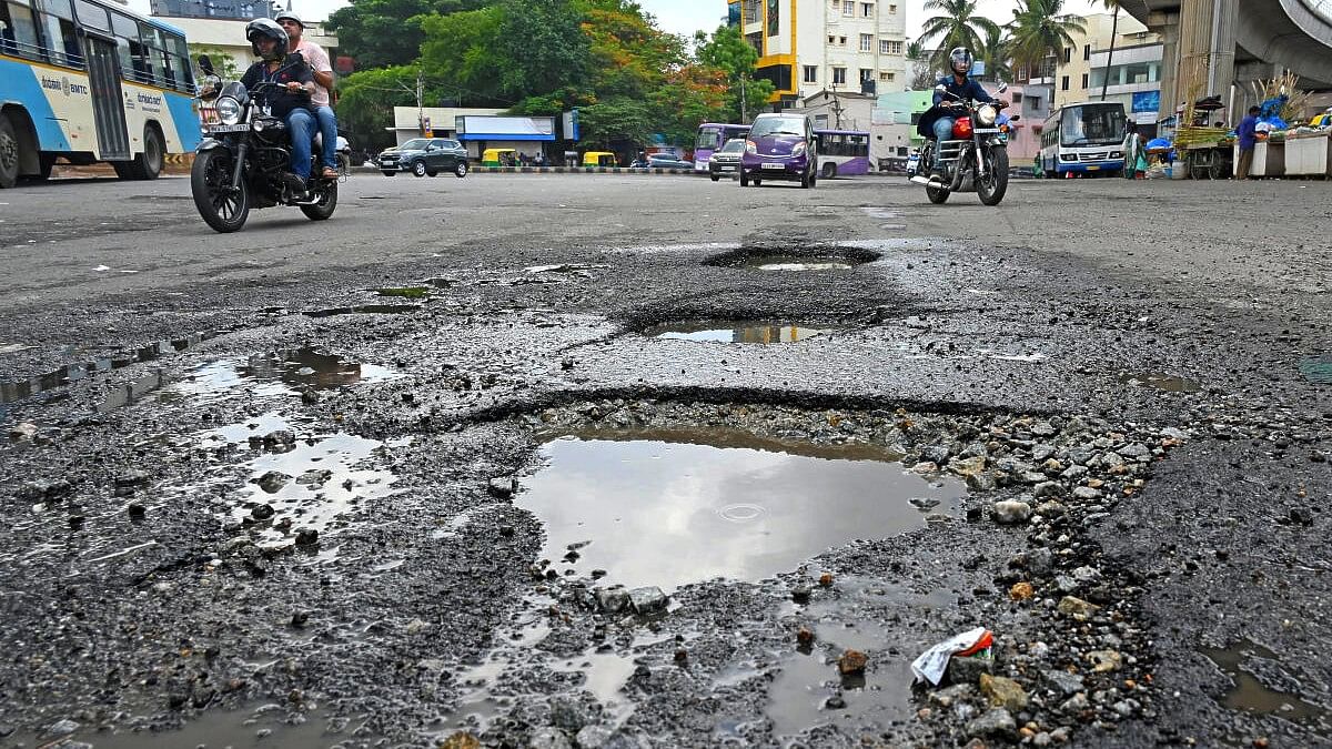 <div class="paragraphs"><p>A pothole in Bengaluru</p></div>