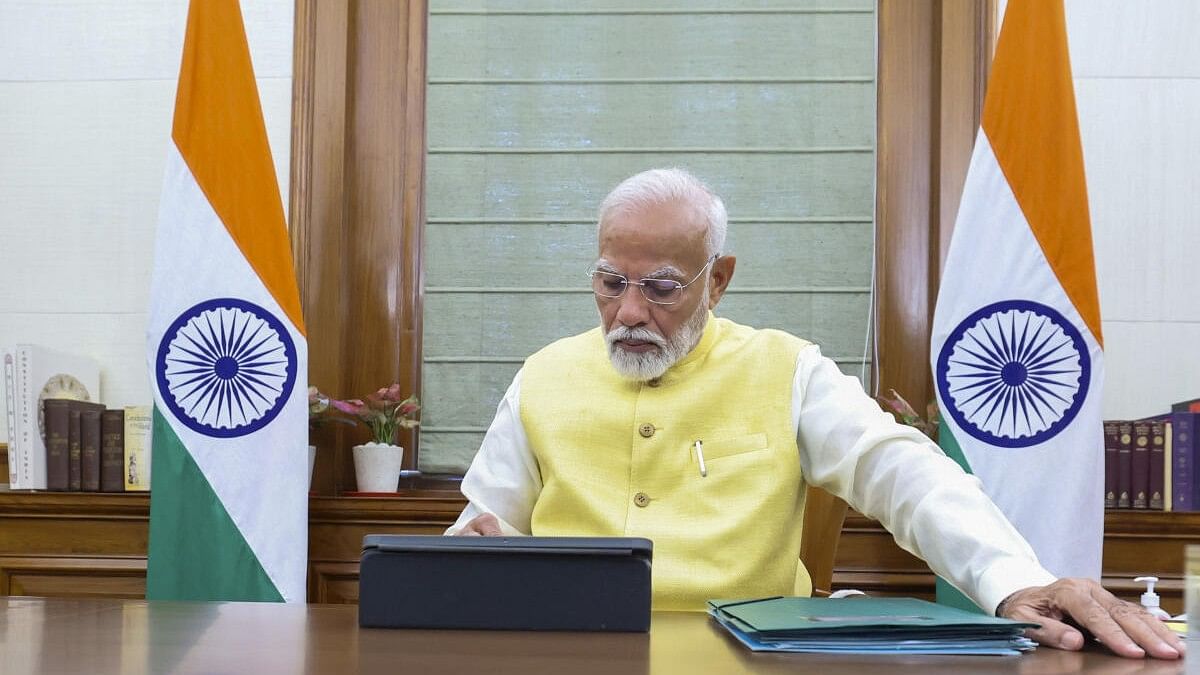 <div class="paragraphs"><p>Prime Minister Narendra Modi takes charge of the office.</p></div>