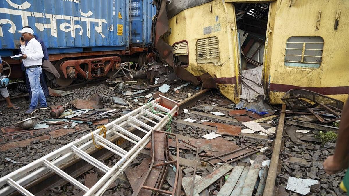 <div class="paragraphs"><p>Remains of coaches after a collision between the Kanchanjungha Express and a goods train near Rangapani railway station.</p></div>