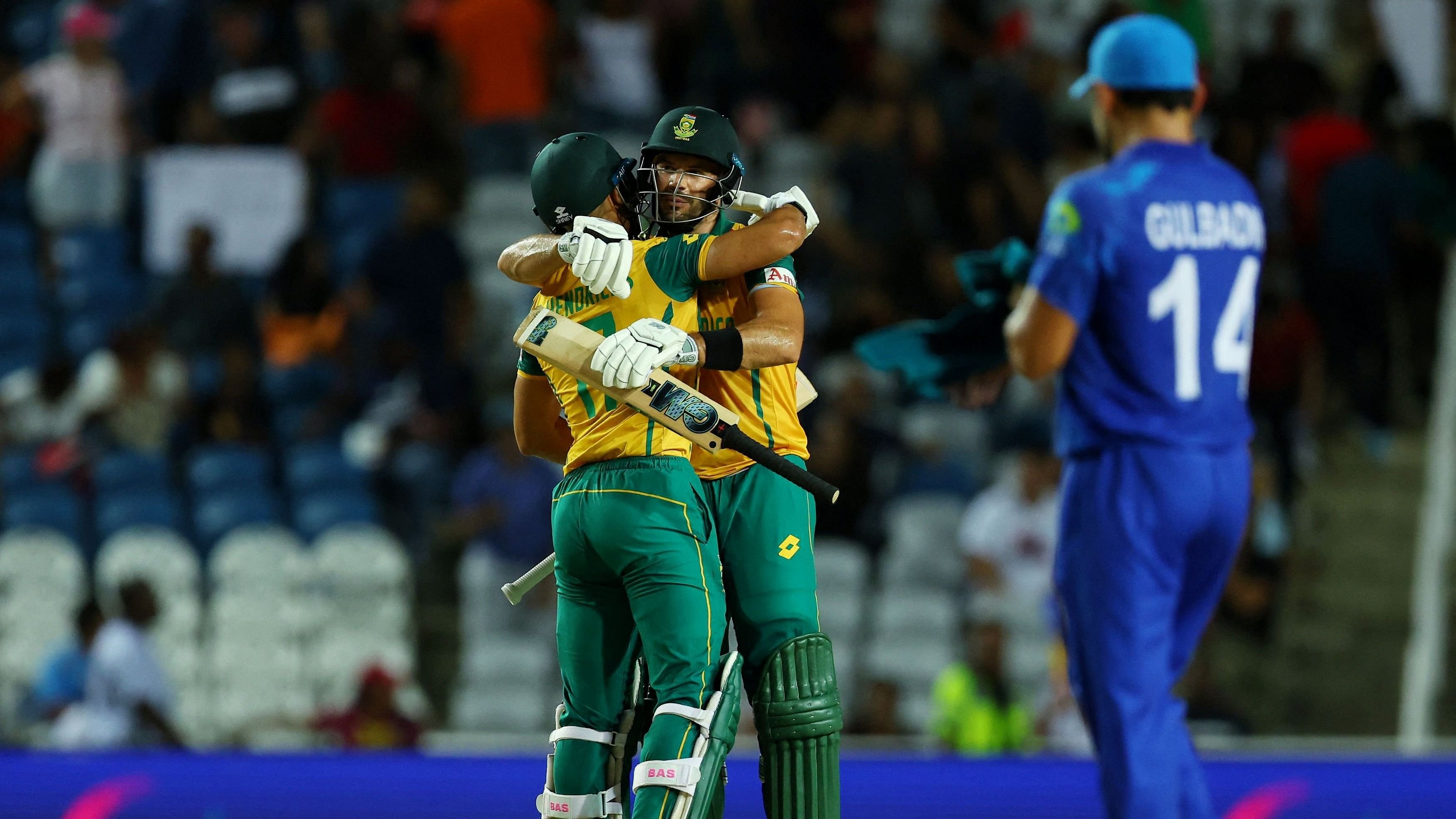 <div class="paragraphs"><p>T20 World Cup Semi Final - South Africa v Afghanistan: South Africa's Aiden Markram and Reeza Hendricks celebrate after winning the match at the Brian Lara Stadium, Tarouba, Trinidad and Tobago on June 27 (IST), 2024.</p></div>