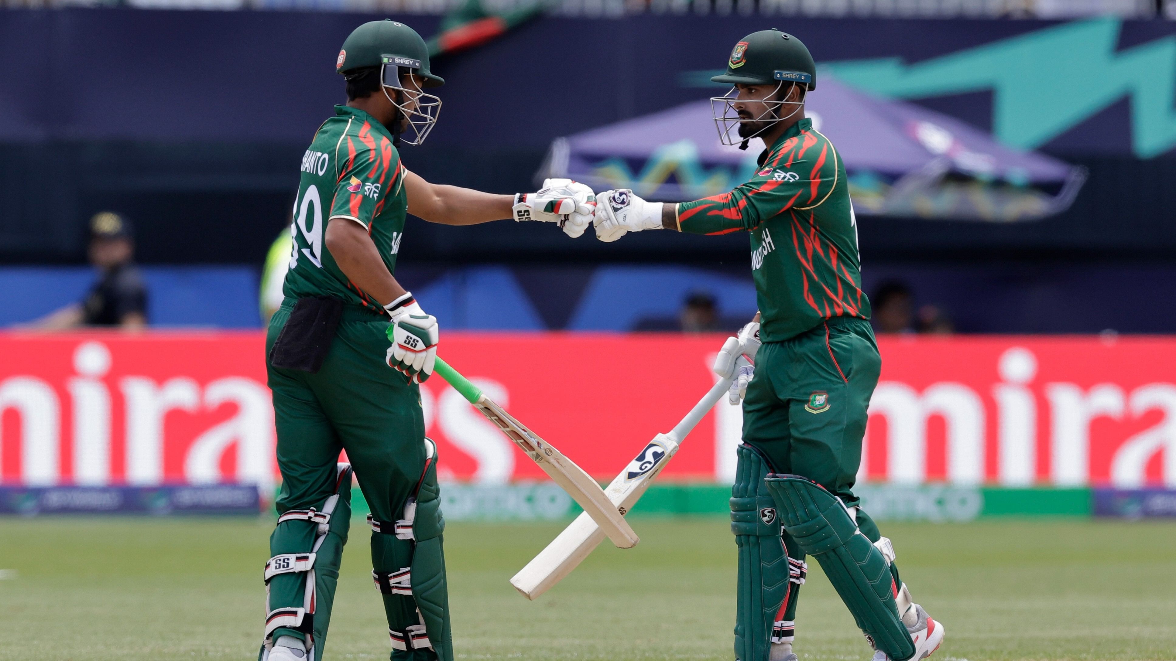 <div class="paragraphs"><p>File photo of&nbsp;Bangladesh's captain Najmul Hossain Shanto, left, fist bumps with batting partner Litton Das.</p></div>