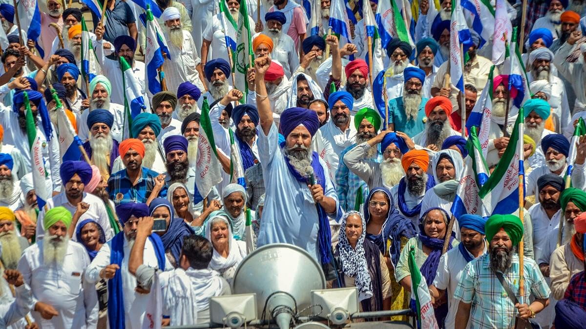 <div class="paragraphs"><p>Farmers stage a protest march in Amritsar.</p></div>