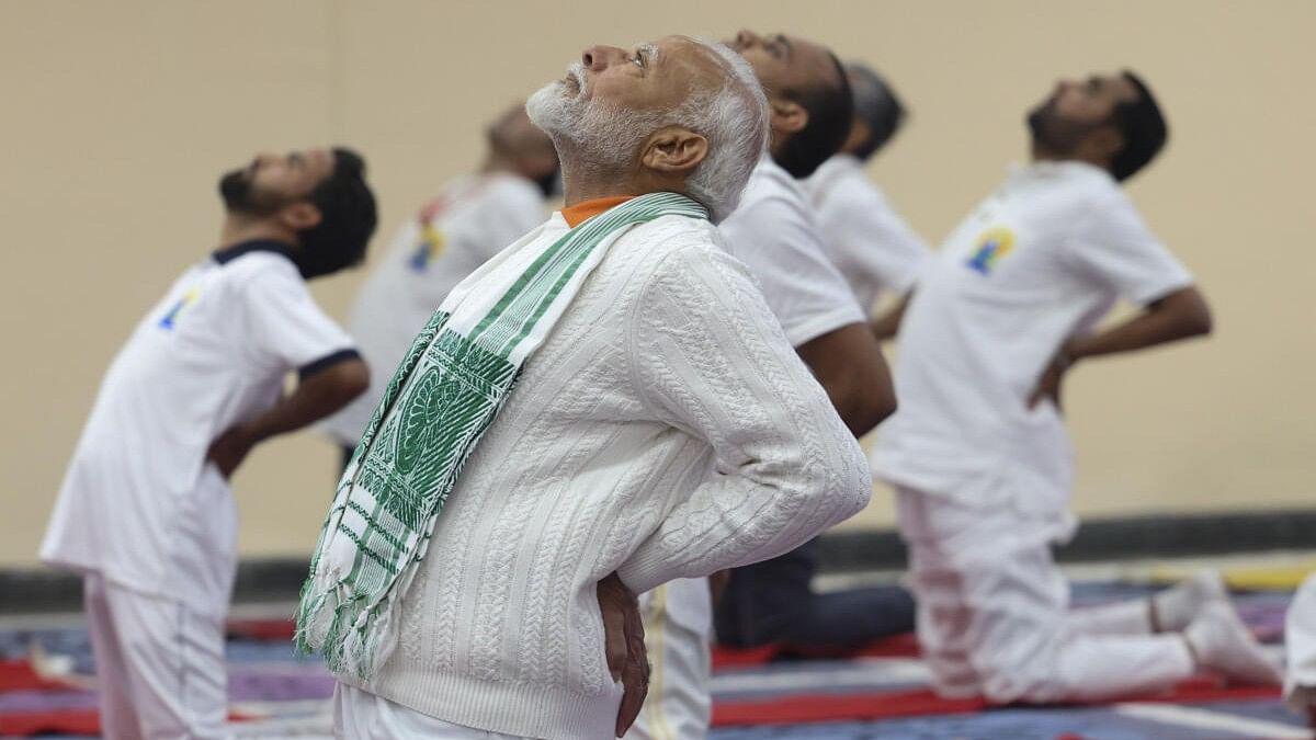 <div class="paragraphs"><p>Prime Minister Narendra Modi performs yoga during celebration on the 10th International Day of Yoga, in Srinagar, Friday, June 21, 2024.</p></div>