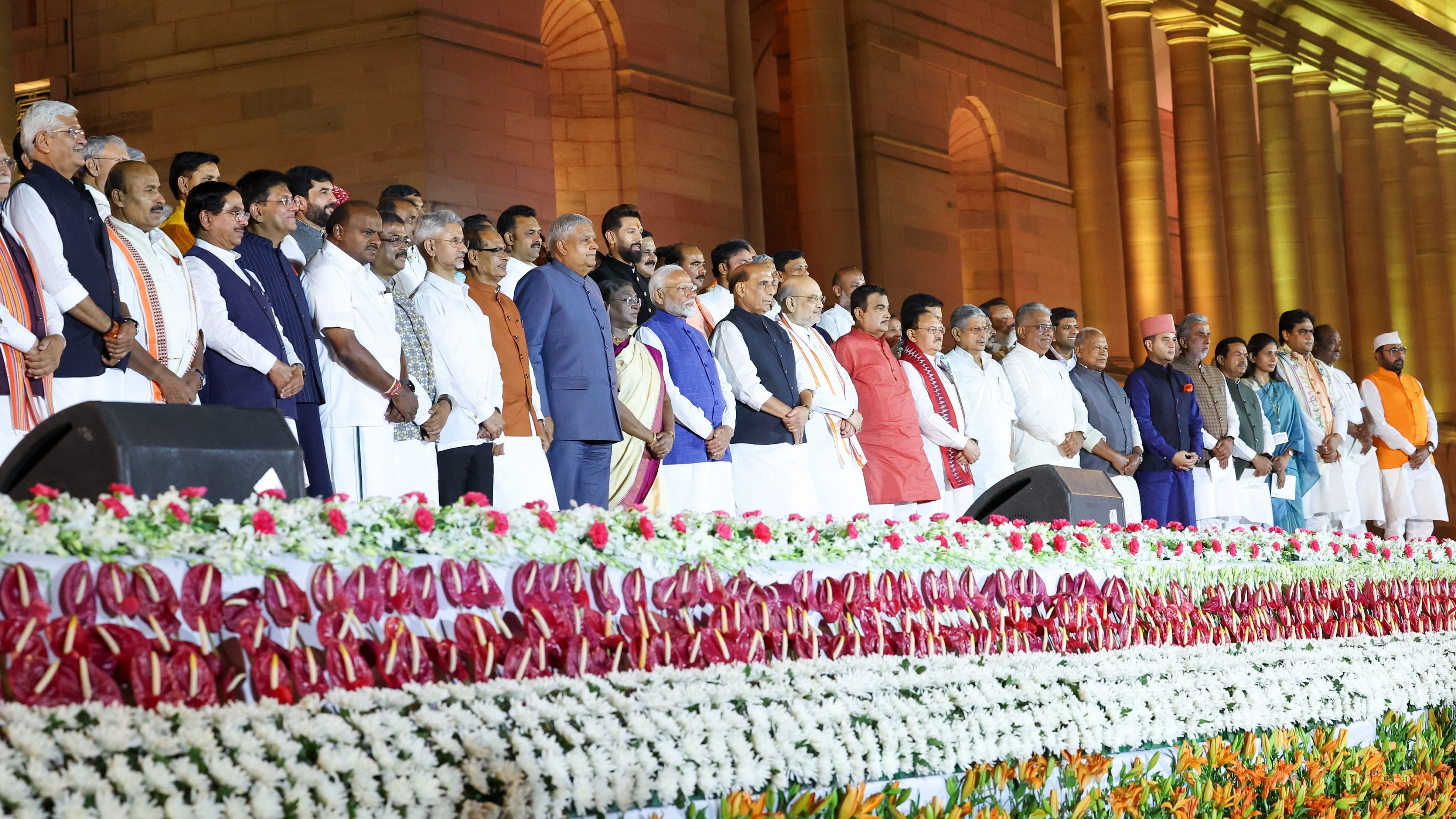 <div class="paragraphs"><p>President Droupadi Murmu and Vice President Jagdeep Dhankhar with Prime Minister Narendra Modi and other ministers at the swearing-in ceremony of new Union government, at Rashtrapati Bhavan in New Delhi, Sunday, June 9, 2024.</p></div>