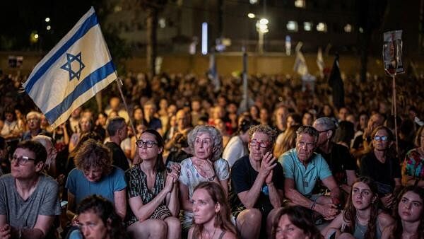 <div class="paragraphs"><p>People attend a rally in support of hostages in Gaza, asking for their release, amid the ongoing Israel-Hamas conflict, in Tel Aviv, Israel.</p></div>