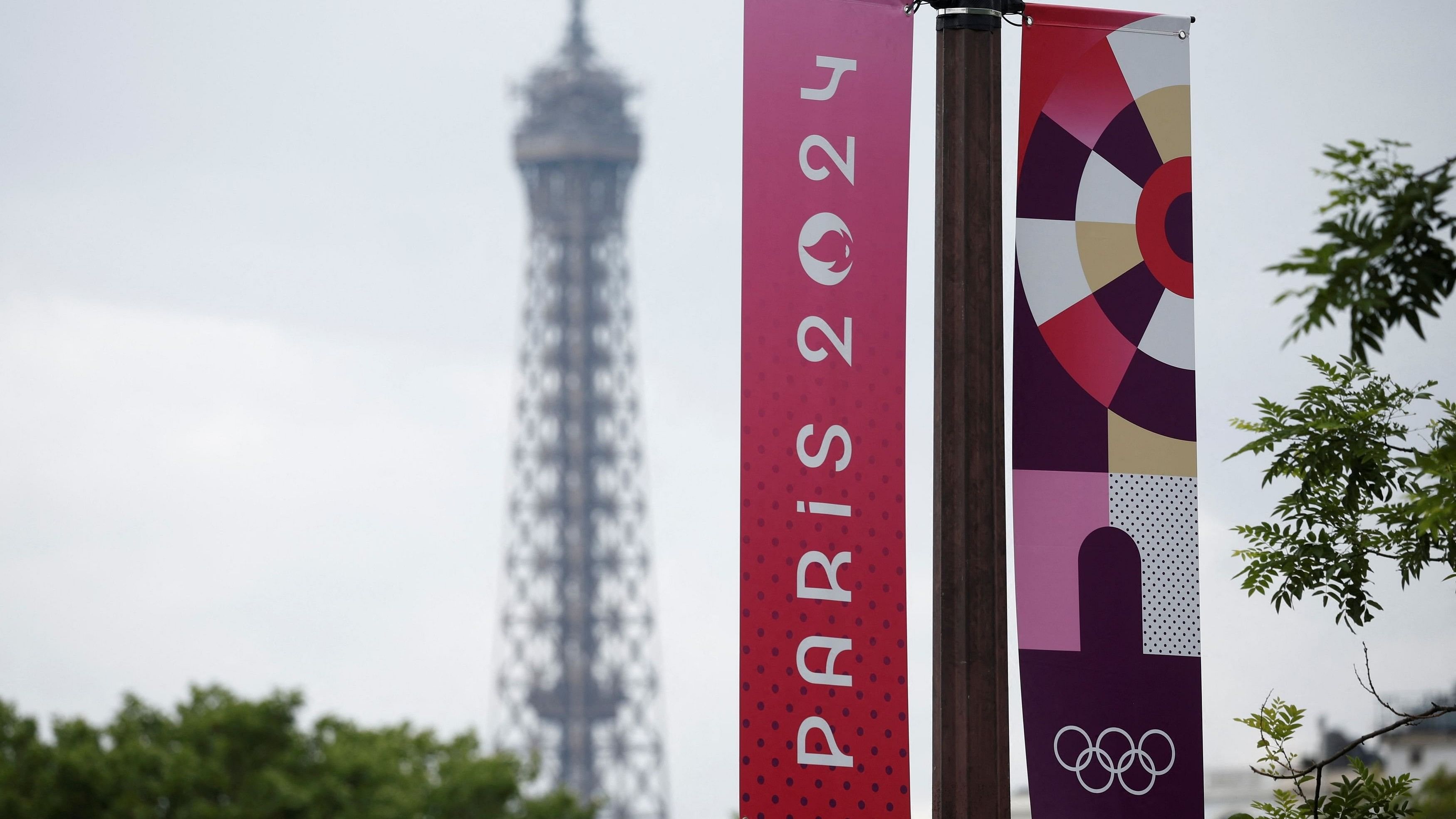 <div class="paragraphs"><p>Olympic signage is displayed with the Eiffel Tower in the background ahead of the Paris 2024 Olympic games in Paris, France, June 20, 2024.&nbsp;</p></div>