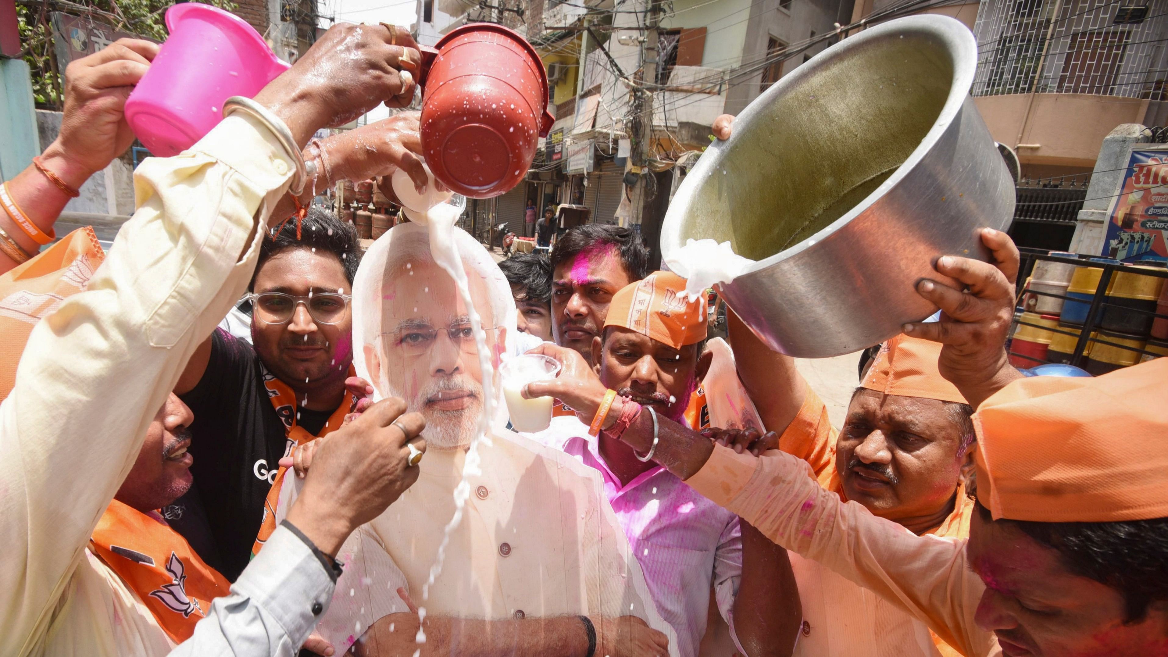 <div class="paragraphs"><p>BJP workers celebrate during the swearing-in-ceremony of PM-Narendra Modi for the third consecutive term, in Ranchi.</p></div>