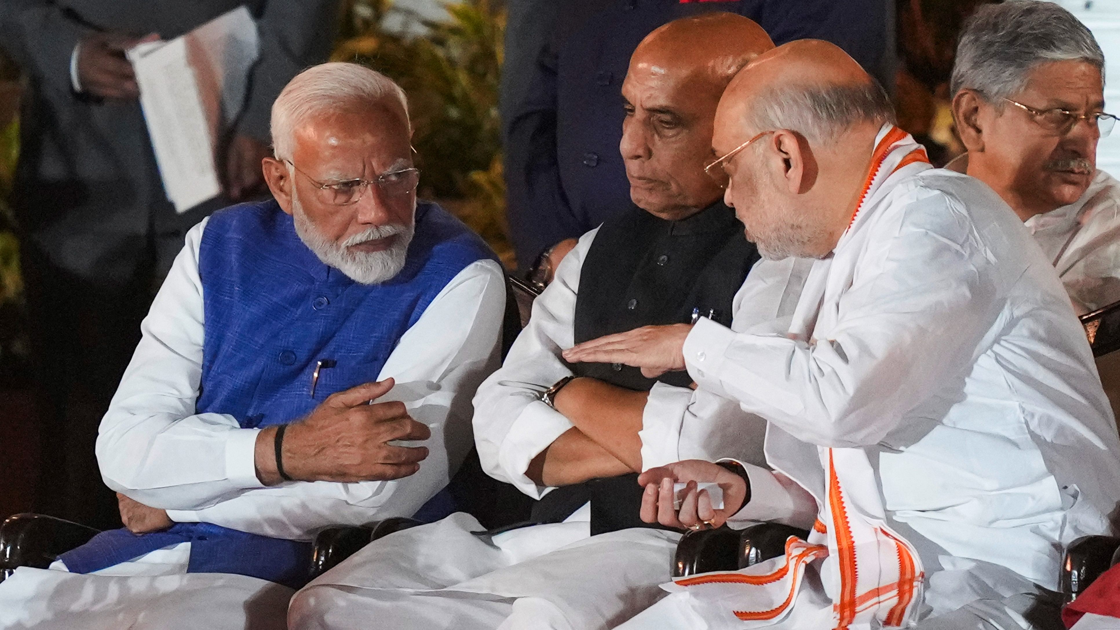 <div class="paragraphs"><p>File photo of&nbsp;Prime Minister-designate Narendra Modi with MP-elects Rajnath Singh and Amit Shah.</p></div>