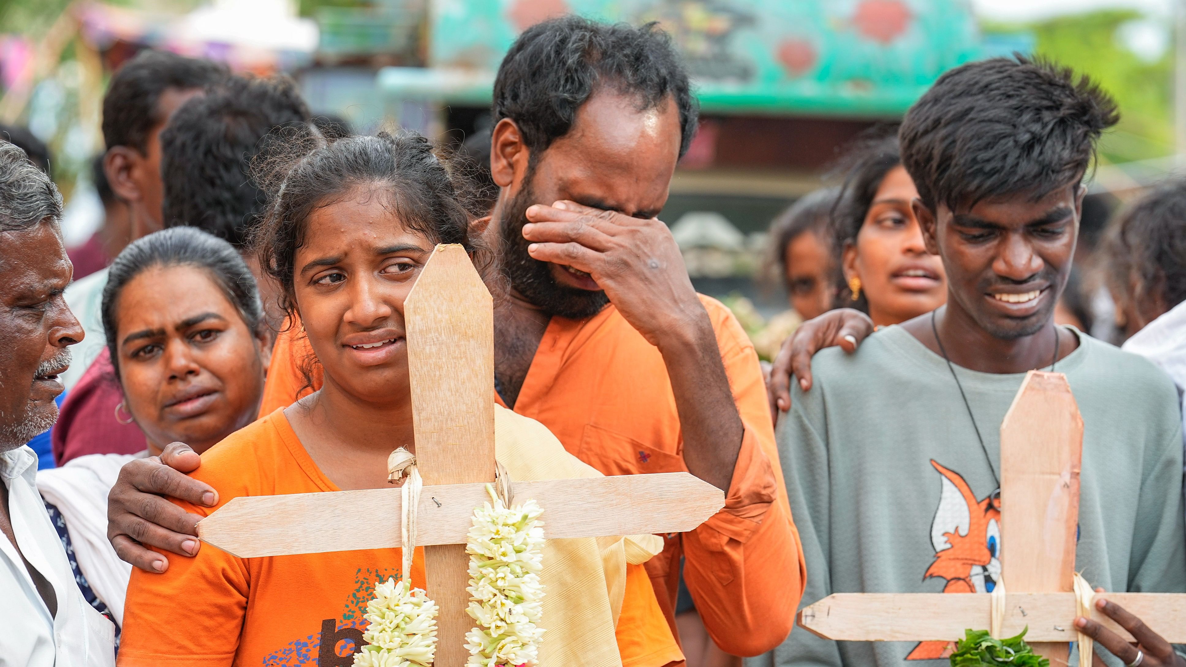<div class="paragraphs"><p>People mourn after the deaths of their family members due to consumption of spurious liquor, in Kallakurichi district, Thursday, June 20, 2024.</p></div>