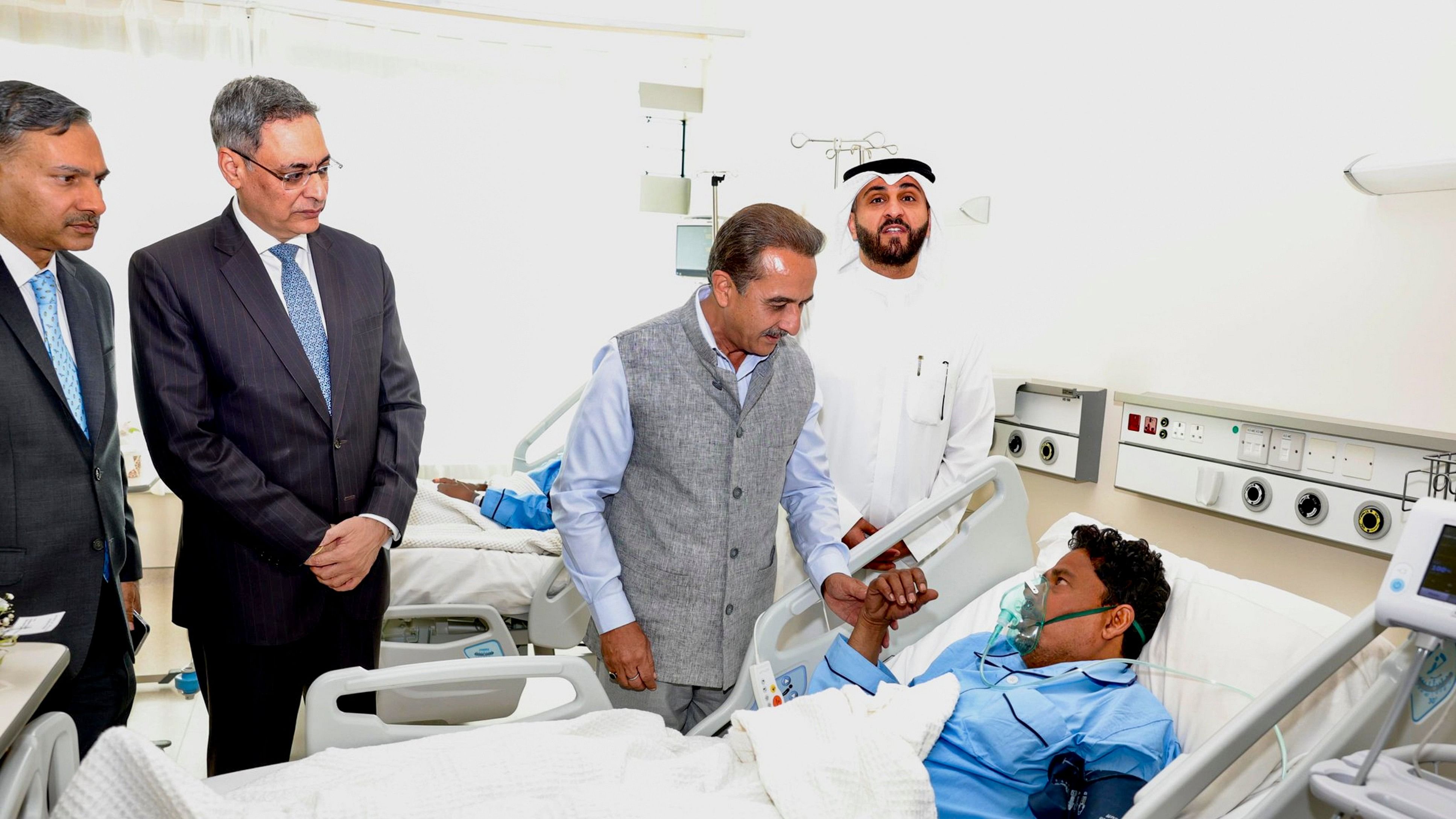 <div class="paragraphs"><p>MoS for External Affairs Kirti Vardhan Singh meets Indians injured in a fire incident at the Jaber hospital, in Kuwait.</p></div>