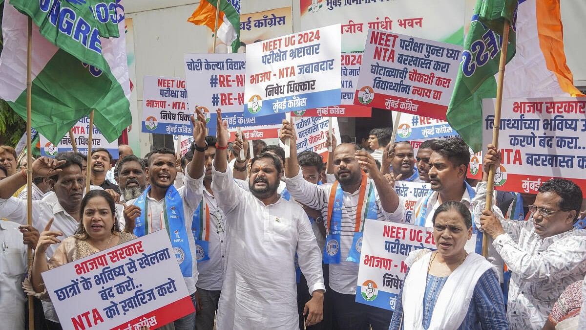 <div class="paragraphs"><p>Congress workers stage a demonstration against alleged irregularities in the NEET examinations, in Mumbai, Friday, June 21, 2024. </p></div>