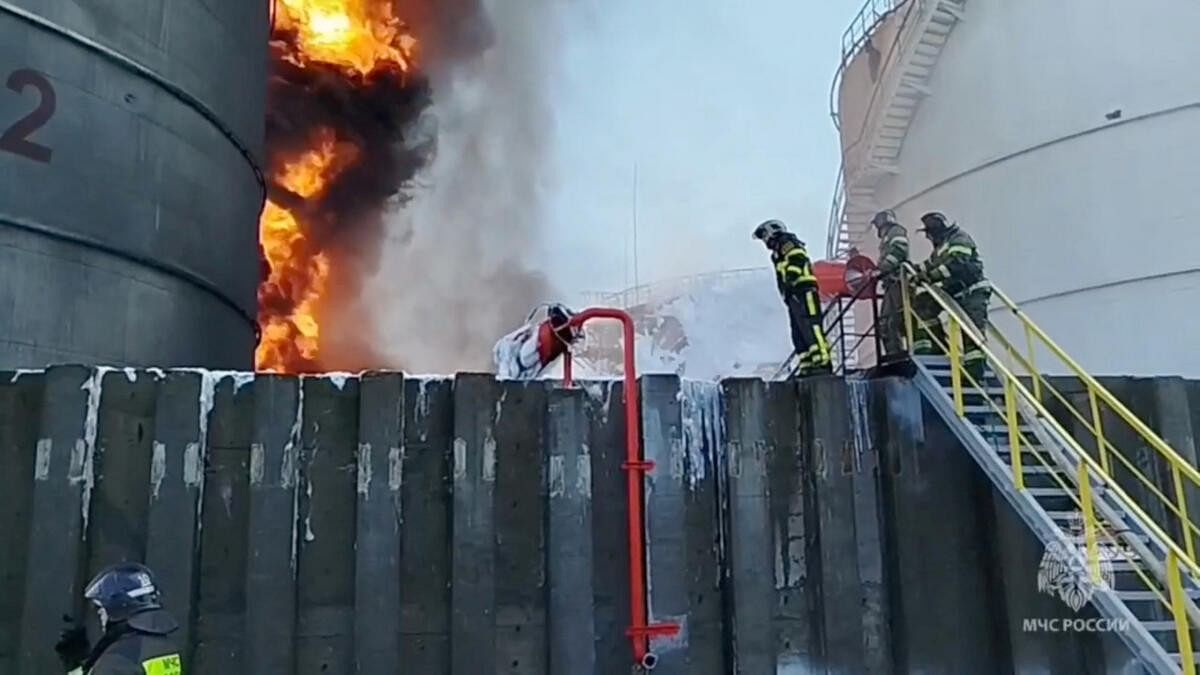 <div class="paragraphs"><p>Members of the Russian emergencies ministry work to extinguish fire at an oil storage tank after an alleged drone attack in the town of Azov in the southern region of Rostov, Russia.&nbsp;</p></div>